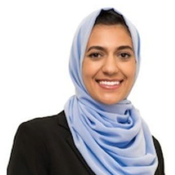 woman wearing a black shirt and a light blue hijab smiling