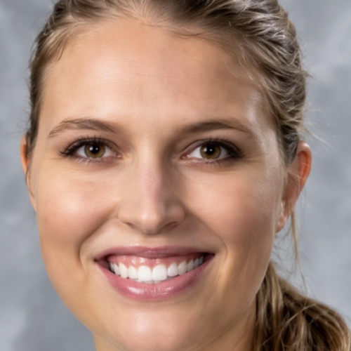 woman smiling wearing a white shirt